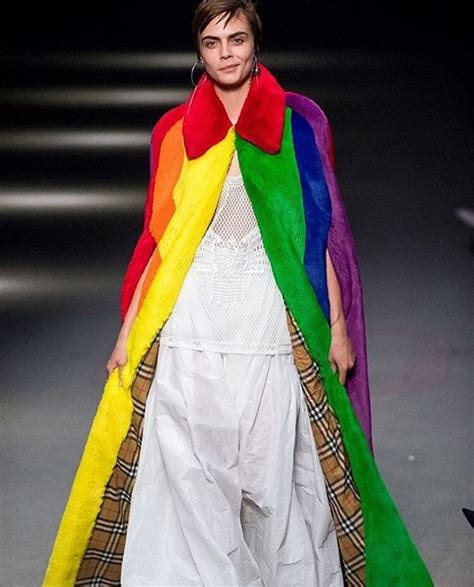 Cara Delevingne closed Burberry in a giant rainbow cape